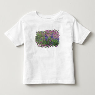 USA, Texas Hill Country. Blaues Lupinen unter Phlo Kleinkind T-shirt