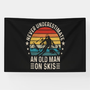 Uunterschätze niemals einen alten Mann auf Skiern Banner