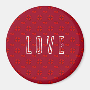 Valentinins rotes Herz auf der roten Liebe Magnet