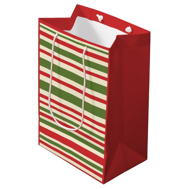Variable Streifen Weihnachtsmuster Rote Grüne Crem Mittlere Geschenktüte (Vorderseite Schrägansicht)