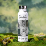 Vater mit Kindern und Vater 6 FotoCollage Trinkflasche<br><div class="desc">Vater mit Kindern und Vater 6 Foto Collage Wasserflasche. Collage von 6 Fotos, väterlicher Name mit einer süßen Nachricht in einem trendigen schwarzen Skript und Namen von Kindern, die die Fotos überlagern. Fügen Sie Ihre 6 Lieblings-Fotos hinzu. Der süße Sake und ein Geschenk zum Geburtstag, Vatertag oder Weihnachten für einen...</div>