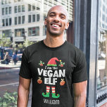 Vegane Elffamilienpassende Weihnachtsmarke T-Shirt<br><div class="desc">Erleben Sie den Urlaubssinn mit diesem lustigen Veganen Elf-T - Shirt, der Teil einer passenden Kollektion mit Geschenken für alle Familienmitglieder ist. Dieser T - Shirt ist perfekt für jede Weihnachtsfamilie oder als Familienmitglied geeignet und verfügt über einen niedlichen Elfhut und -beine, mit der Beschriftung "I'm the Vegan elf" in...</div>