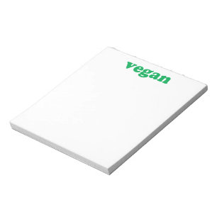 "vegane" grüne Buchstaben, weißer Hintergrund Notizblock