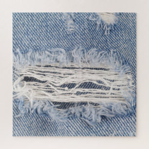 Verblasste zerrissene Jeans-Textur