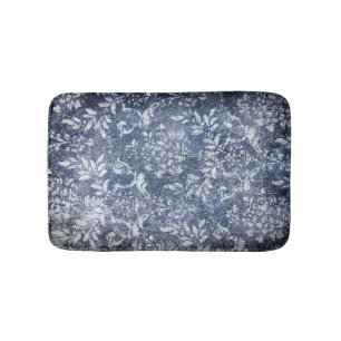 Verblasster Blumenbeweis: Grungy texturierter Hint Badematte
