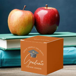 Verbrennbare orange quadratische Abschlussfeier an Geschenkschachtel