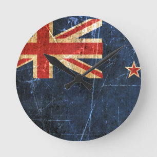Verkratzte und getragene Vintage Neuseeland-Flagge Runde Wanduhr