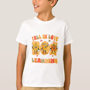 Verliebe dich in das lustige Lehrer-Herbst-Kürbis- T-Shirt