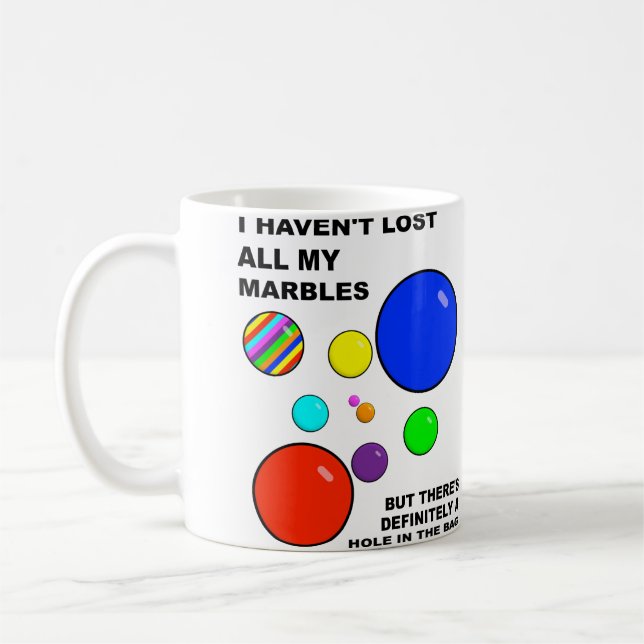 Verlieren meiner Marmor-lustigen Tasse (Links)