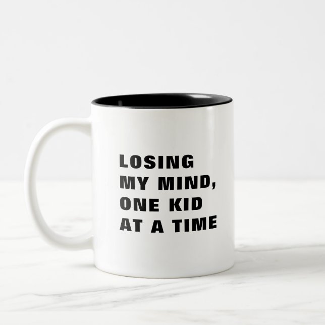 Verlieren von einem Kind nach dem anderen Zweifarbige Tasse (Links)
