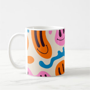 Verschiedene bunte schmelzende lächelnde Gesichter Kaffeetasse