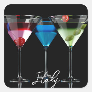 Verschiedene Cocktails in Martini-Brillen auf schw Quadratischer Aufkleber