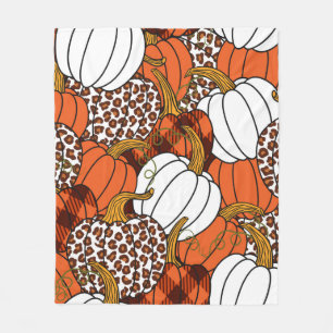 Verschiedene Kürbis. Leopard, orange, weiß und Fleecedecke