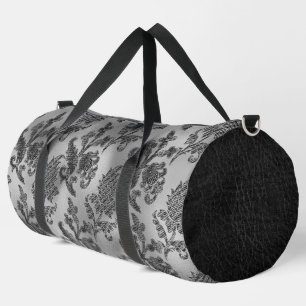 VERZIERTE BLUMENPATTER AUS SCHWARZ UND SILBER DUFFLE BAG
