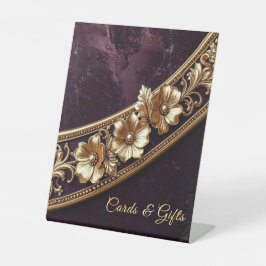 Verzierte goldene Blumendekorationen für den Tisch Sockelschild