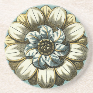 Verziertes Blumenmedaillon auf hellblauem Getränkeuntersetzer