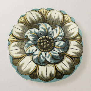 Verziertes Blumenmedaillon auf hellblauem Rundes Kissen