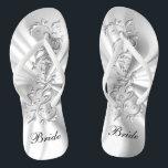 Verziertes Design mit weißem Satin und Silber | Br Flip Flops<br><div class="desc">Brautparty Flop Shoes bereit für Sie zu personalisieren. Wenn nötig... Sie können mit dem Zazzle-Design-Tool-Bereich mit Ihren eigenen Texten, Textfarben und Schriftart neu starten. ✔ Hinweis: Nicht alle Vorlagenbereiche müssen geändert werden. 📌 Wenn Sie weitere Anpassungen benötigen, klicken Sie bitte auf den Button "Weitere Anpassungen vornehmen" oder "Design anpassen oder...</div>