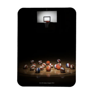 Viele Basketbälle, die auf dem Boden stillstehen Magnet