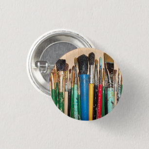 Viele farbenfrohe Malpinsel Button