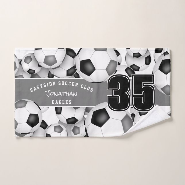 Viele schwarz-graue Fußballbälle Mannschaftsfarben Handtuch (Handtuch)