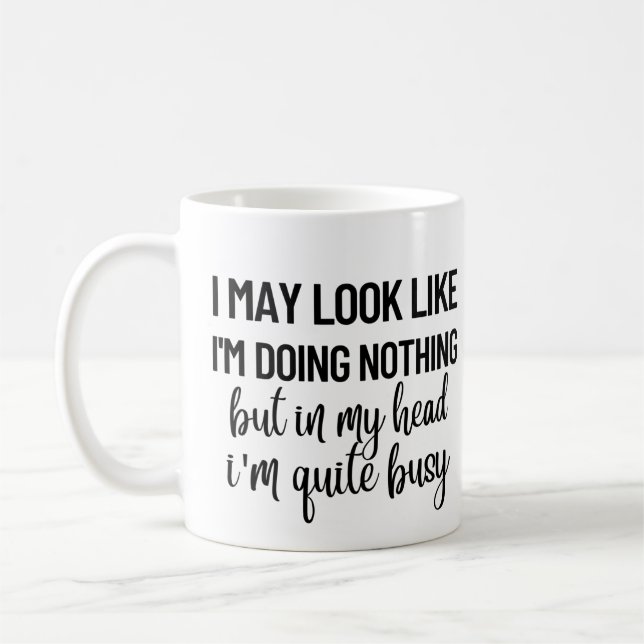 Vielleicht sehe ich so aus, als tue ich nichts kaffeetasse (Links)