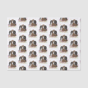 Vier Kavalier King Charles Spaniels in Blume Seidenpapier