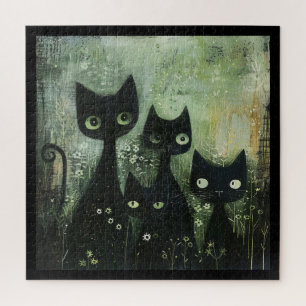 Vier schwarze Katzen mit Gänseblümchen auf gemisch