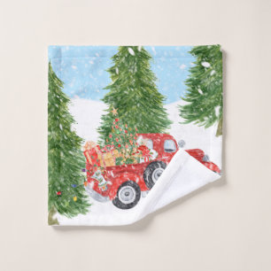 Vieux camion pick-up rouge passant par la neige