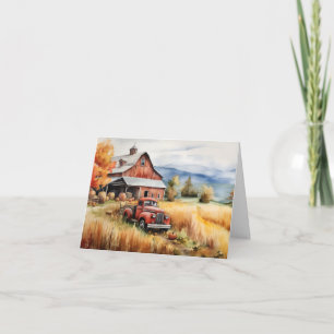 Vieux camionnette et étable rouge en automne blanc