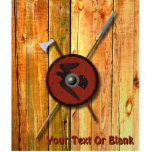 Viking Raven Shield And Weapons Fotoskulptur Magnet<br><div class="desc">A 3D rendering of a Viking shield along with a battle ax and spear hanging on a rough wooden plank surface, perhaps the interior wall of a longhouse. The shield is decorated with a black raven (Corvus corax) painted on red leather. Add your own text. The methods and materials used...</div>