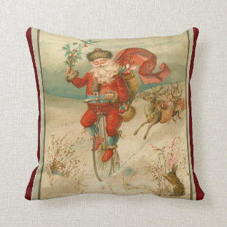Viktorianischer Weihnachtsmann auf dem Rad Kissen