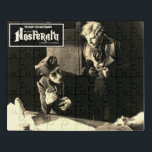 Vintag 1922 Nosferatu Puzzle<br><div class="desc">Feiern Sie mit diesem 1922 erschienenen Nosferatu Akrylpuzzle aus dem Jahr 1922 mit der Dose aus CinemaZone Merchandise eines der großartigen Horror-Meisterwerke des Kinos! Passen Sie es an und passen Sie es an,  wie Sie es möchten,  um Ihnen das besondere Aussehen zu geben. Nehmt euch die Zuhause!</div>