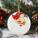 Vintag Jolly Santa Claus Weihnachten Keramik Ornament<br><div class="desc">Dieser Jolly Santa wird sicher ein festliches Vintages Gefühl zu Weihnachten bringen. Oranment schmückt einen rosaroten Weihnachtsmann in seinem roten Hut und einen Hauch von Misteloe.</div>