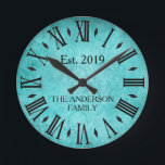 Vintage Elegant Family Name Roman Numeral Teal Runde Wanduhr<br><div class="desc">Beautiful, unique, one-of-a-kind shabby chic, vintage personalized design features a vintage Victorian lace background in teal green with your family name and year established in black typography. Personalize this clock by adding your own personal information. Makes a great wedding, anniversary, or housewarming gift. Click "personalize this template" to change the...</div>