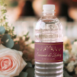 Vintage Gold Flourish Maroon Burgundy Wedding<br><div class="desc">These beautiful water bottle labels will make your wedding celebration all the more special. They Feature hat einfach yet elegant design with gold script lettering on marokon, burgundy or wine red colored background with a vintage gold filigree floral border. There are spaces to enter the wedding paar Names as well...</div>
