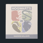 Vintage HOGWARTS™ Stamped Crest Notizblock<br><div class="desc">Show your house pride in bold, vintage-inspired style with this striking Hogwarts™ crest design. Featuring graphic silhouettes representing the four iconic houses — Gryffindor™, Slytherin™, Hufflepuff™, and Ravenclaw™ — this artwork blends classic symbolism with a modern, retro aesthetic. Each house emblem is set within a clean, color-blocked shield, creating a...</div>