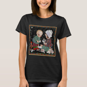 Vintage Kinder mit einem Tee-Party, das sich vortä T-Shirt