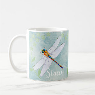 Vintage Libelle auf verblaßtem Blumenhintergrund Kaffeetasse