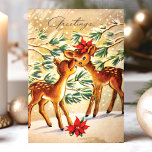 Vintage Poinsettia Deh im Schnee Weihnachten<br><div class="desc">Vintage Poinsettia Deer in Schnee Weihnachtskarte. Dieses Design zeigt zwei Hirsche im Schnee mit Poinsettia Blume. Was für eine schöne Retro-Urlaubsszene. Personalisieren Sie dieses maßgeschneiderte Design mit Ihrem eigenen Innen-Gruß.</div>