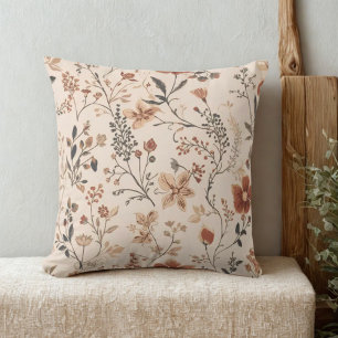 Vintage-rustikales Blumenmuster auf Creme Kissen