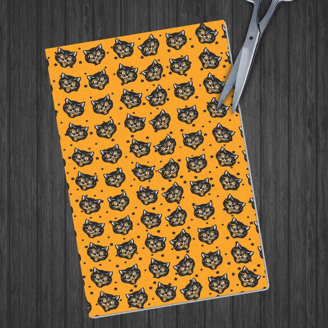 Vintage schwarze Halloween-Katzengesicht Schwarze  Seidenpapier (Happy vintage Halloween black cat faces on orange tissue paper with little black stars.)