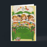 Vintage Weihnachtsgruß-Karte Feiertagskarte<br><div class="desc">Retro/Vintage Weihnachtsgrußkarte.  Vier entzückende Kinder ganz gemütlich in ihrem Bett,  träumend von den Weihnachtsspielwaren und von den Leckereien!  Glückliches Weihnachten und zu allem eine gute Nacht!</div>
