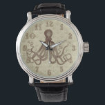 Vintager brauner Kraken mit Ankern Armbanduhr<br><div class="desc">Dieser wunderschöne antike Oktopus, der* aus dem 19. Jahrhundert zeichne, wurde in Braun aufgefärbt und auf einem hübsch hellbraun - beige bedrängt / grunge Hintergrund mit einem schwachen Ankermuster platziert. Das Ergebnis ist eine originelle Uhr, die zu Ihrem Thema Wassersport und Strand oder Steampunk passt. Die Uhrennummern werden in einem...</div>