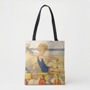 Vintager Junge spielt am Strand mit Sandspielzeug Tasche