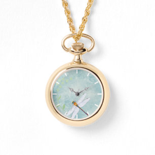 Vintager Libellenfliege im Hintergrund verblasster Armbanduhr