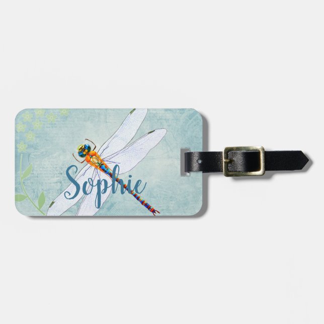 Vintager Libellenfliege im Hintergrund verblasster Gepäckanhänger (Vorderseite horizontal)