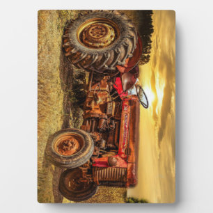 Vintager roter Zuchttraktor Fotoplatte