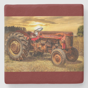 Vintager roter Zuchttraktor Steinuntersetzer