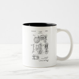 Vintager Spielzeug-Bauernhof-Traktor des Zweifarbige Tasse